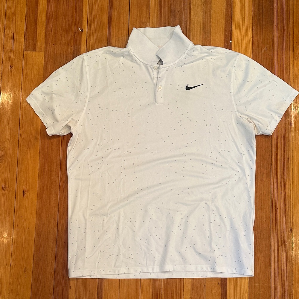Nike Men’s White Polo with Black Swoosh and Subtle Dot Pattern